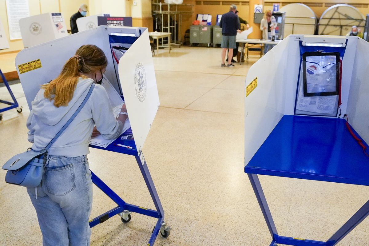 June Harkrider, who turned 18 in March, marks her ballot as she votes for the first time during early voting in the primary election, Monday, June 14, 2021, at the Church of St. Anthony of Padua in the Soho neighborhood of New York.  (Mary Altaffer)