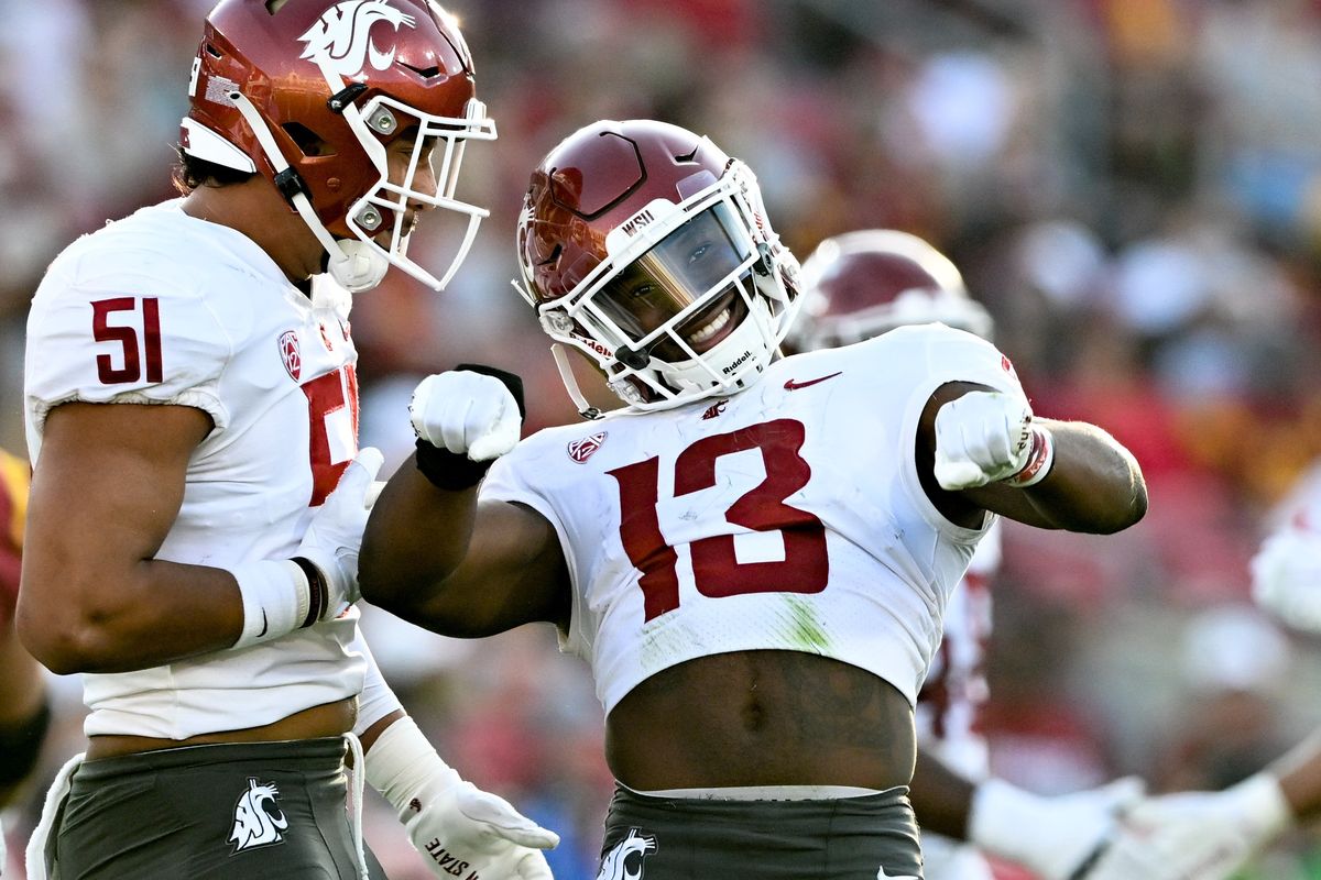 Washington State safety Jordan Lee celebrates after making a tackle in the backfield during last Saturday’s Pac-12 game against USC at Los Angeles Memorial Coliseum.  (Tyler Tjomsland/The Spokesman-Review)