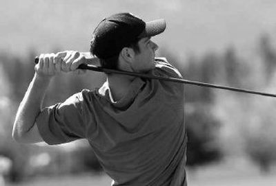 
Regional medalist Tyler Johnson of Coeur d'Alene tees off on the eighth hole at Prairie Falls Golf Course. 
 (Jesse Tinsley / The Spokesman-Review)