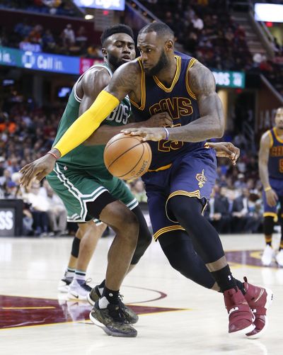 LeBron James scored 30 points and the Cavs remained perfect on the young season. (Ron Schwane / Associated Press)