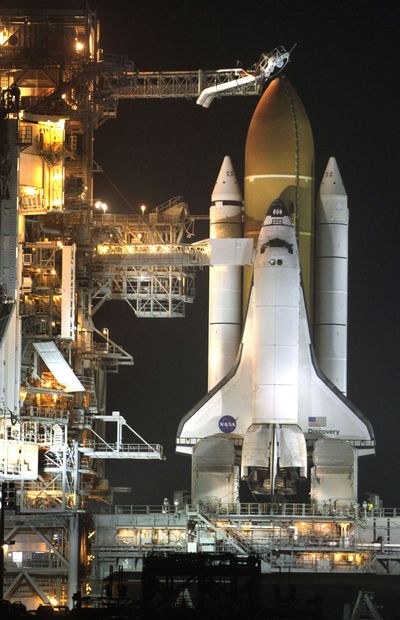 Space shuttle Discovery stands ready for launch at Pad 39A at the Kennedy Space Center in Cape Canaveral, Fla., on Wednesday. (Associated Press)