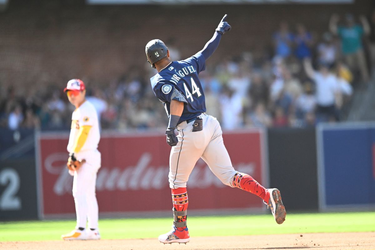 Julio Rodriguez (44) of the Seattle Mariners points into the stands after hitting a two-run home run during the fourth inning of a baseball game against the San Diego Padres on July 4, 2022, at Petco Park in San Diego, California.   (Tribune News Service)