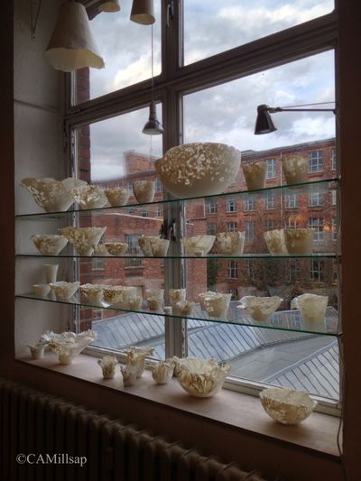The buildings of Leipzig, Germany's historic Spinnerei can be seen through the windows of Claudia Biehne's porcelain studio. (Cheryl-Anne Millsap / photo by Cheryl-Anne Millsap)