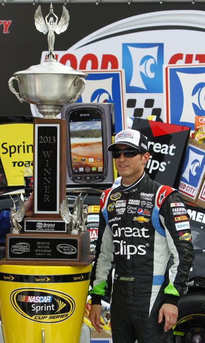 Kasey Kahne poses with the Food City 500 trophy after his first career win in Bristol, Tenn. (Associated Press)