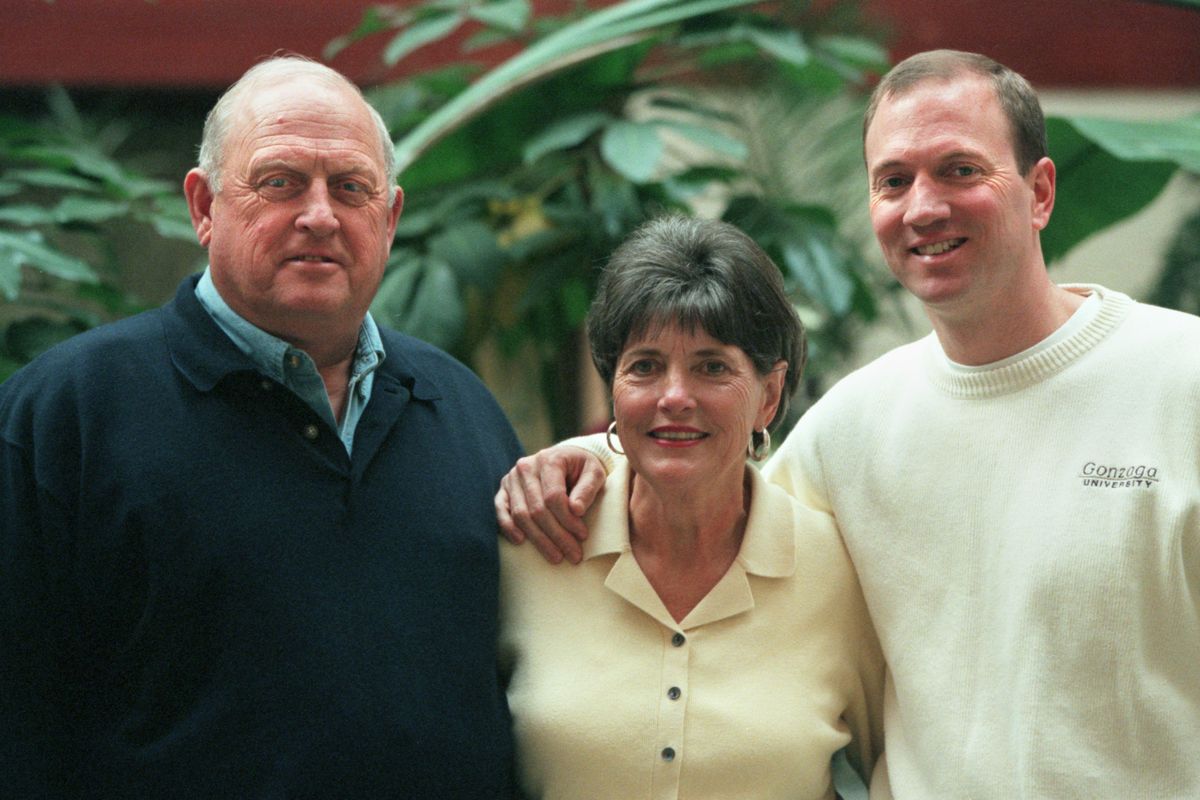 While head coach of Gonzaga, Dan Monson (right) stands with his parents Don and Deanna Monson.  (Spokesman-Review Photo Archives)