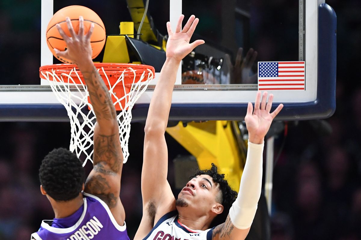 Gonzaga Bulldogs guard Julian Strawther (0) guards Grand Canyon Antelopes guard Chance McMillian (2) at the rim during the first half of a first round NCAA Basketball Tournament game on Friday, March 17, 2023, at Ball Arena in Denver, Colo.  (Tyler Tjomsland/The Spokesman-Review)