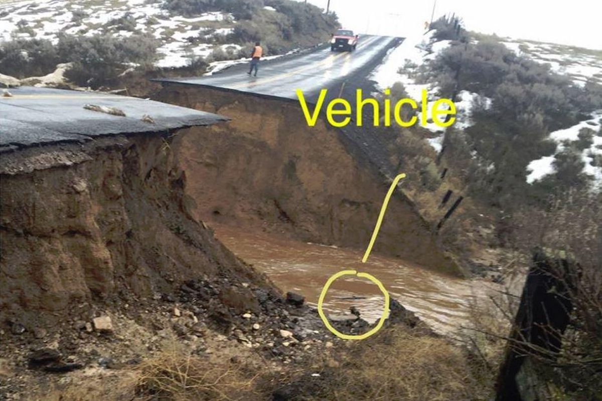 This photo released Thursday, Feb. 17, 2017 by the Adams County Sheriff’s Office shows a washed-out section of Lind Warden Highway. (Adams County Sheriff’s Department)