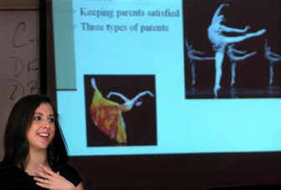 University High School senior Noel Connolly presents her culminating project to fellow students and teachers Thursday morning. Connolly talked about her learning experiences teaching ballet to children at Ballet Arts Academy.
(Holly Pickett / The Spokesman-Review)