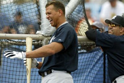 
New York Yankees third baseman Alex Rodriguez, left, can afford to laugh this season with the numbers he's putting up on offense.
 (Associated Press / The Spokesman-Review)