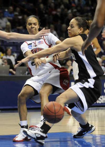 
Maryland's Kristi Toliver, left, has rediscovered a passion for the game after an up-and-down sophomore season last year.
 (Dan Pelle / The Spokesman-Review)