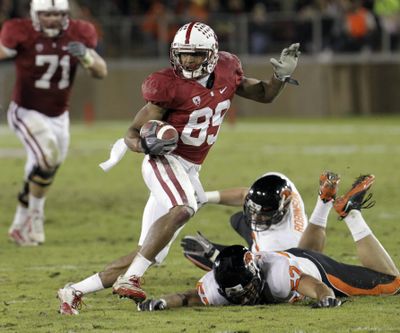 Stanford’s Doug Baldwin runs for a touchdown during the Cardinal’s 38-0 win over Oregon State on Saturday. (Associated Press)