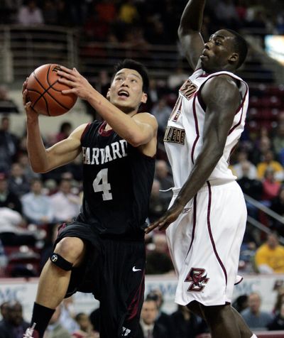 Harvard’s Jeremy Lin drives past B.C.’s Rakim Sanders on Wednesday.  (Associated Press / The Spokesman-Review)