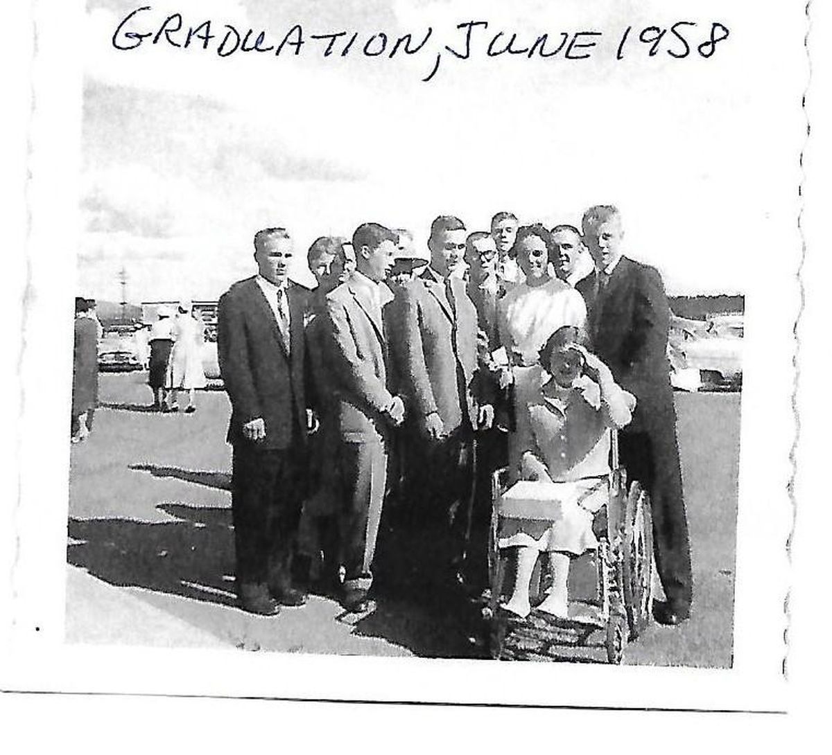 A group graduates from the Rogers High School class of 1958 gathers for a photograph in the parking lot of the old Spokane Memorial Coliseum after the graduation ceremonies. (Courtesy of Lloyd Stevens)