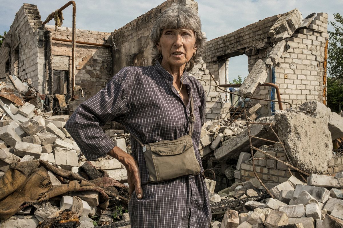 Svitlana Spornyk, surveys the area in Kamianka, eastern Ukraine, July 2, 2023. Settlements along Ukraine