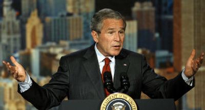 
President Bush answers a question during a news conference at The Museum of Science and Industry Friday, July 7, 2006, in Chicago. 
 (Associated Press / The Spokesman-Review)