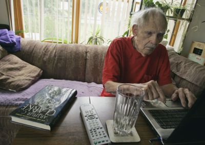 Science fiction writer Frederik Pohl works on his laptop at his Palatine, Ill., home July 22. Polh co-wrote “The Last Theorem” with  longtime friend Arthur C. Clarke  – best known for his 1968 work, “2001: A Space Odyssey.” Clarke originally intended “The Last Theorem” to be his final solo project and began writing it in 2002. Poor health forced Clarke to search for a co-author.  (Associated Press / The Spokesman-Review)