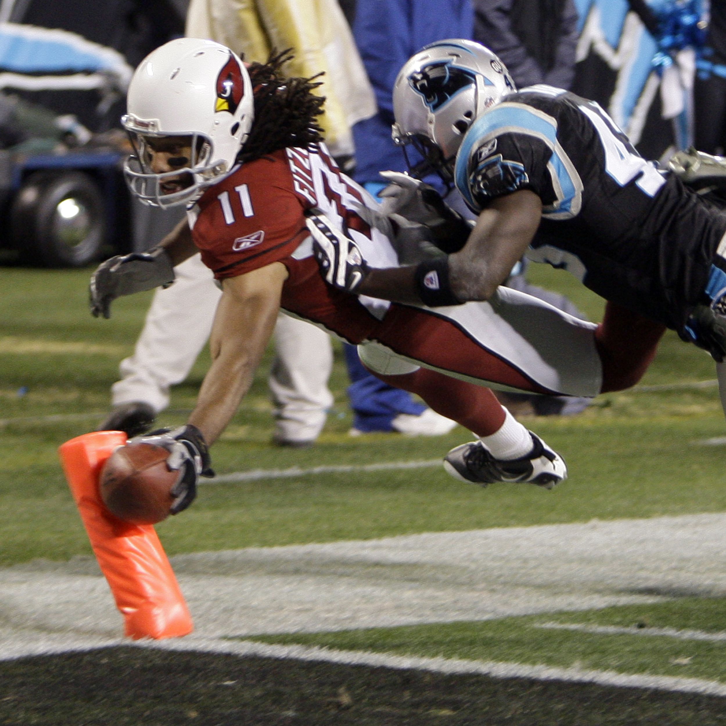 Carolina Panthers defensive end Julius Peppers defends during a