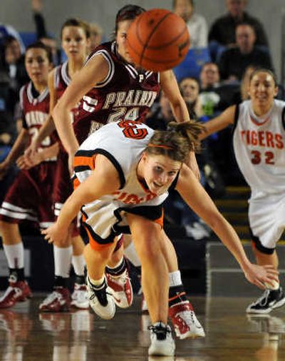 
Daisy Burke and the Lewis and Clark Tigers chased down a third straight basketball state title.
 (File / The Spokesman-Review)