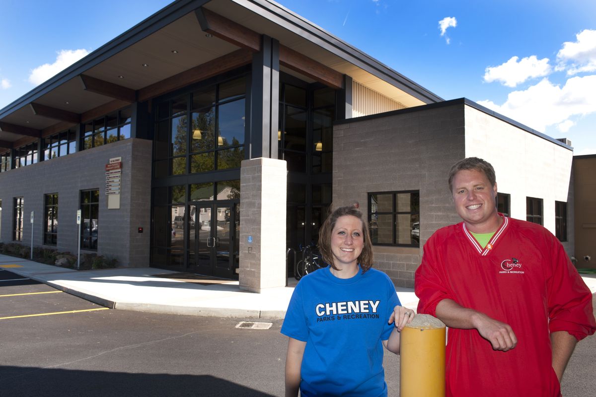 Kim Best and Paul Simmons stand in front of the renovated Wren Pierson Community Center in Cheney. (Colin Mulvany)