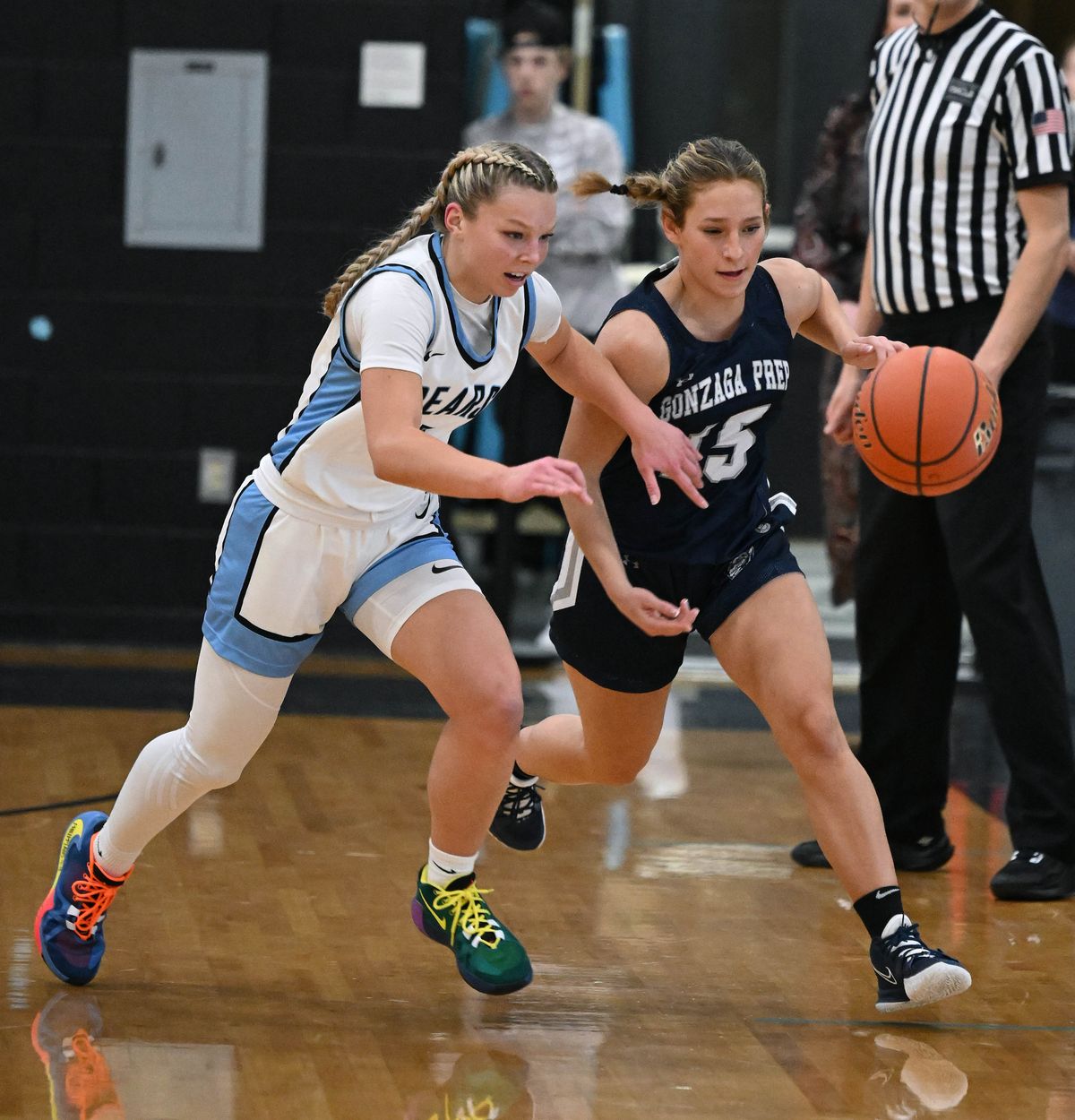 Gonzaga Prep guard Julia Few (15) dribbles the ball downcourt as Autumn Agnew gives chase, Friday, Jan. 20, 2023, at Central Valley High School.  (COLIN MULVANY/THE SPOKESMAN-REVIEW)