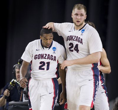 Eric McClellan, left, and Przemek Karnowski have helped the Zags reach new heights. (Colin Mulvany)