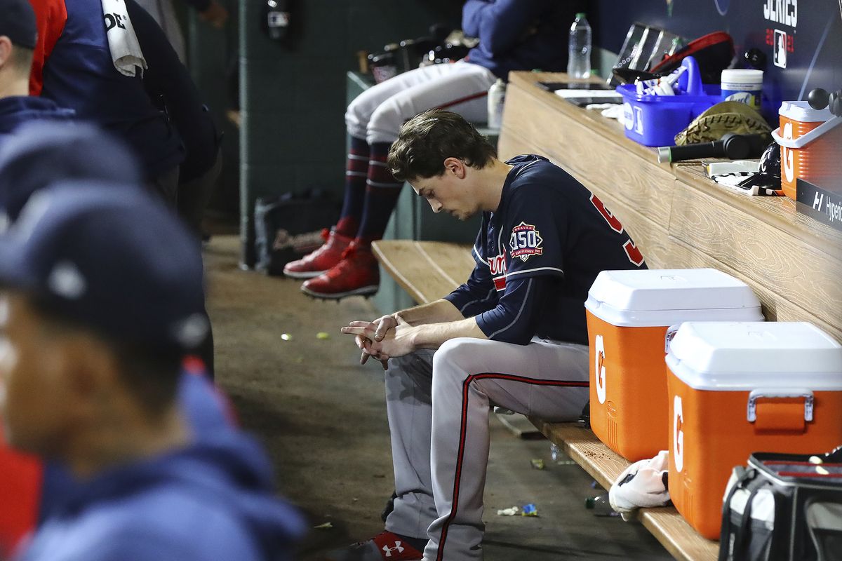 Braves starter Max Fried sits dejected in the dugout during the sixth inning of a 7-2 loss to Houston in Game 2 of the World Series on Wednesday in Houston.  (Curtis Compton)