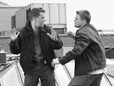 
Actors Matt Damon, left, and Leonardo DiCaprio appear in a scene from 