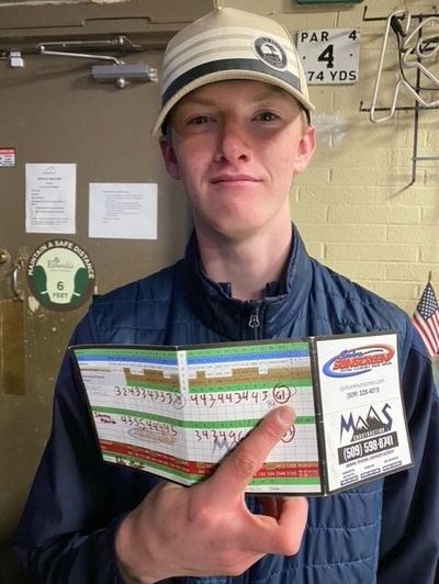 Gonzaga Prep's Dillon Schrock poses with his scorecard after firing a round of 61 in a Greater Spokane League tournament on Monday, April 17, 2023.  (Courtesy)