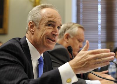 Interior Secretary Dirk Kempthorne, left, sitting next to Interior Department inspector general Earl Devaney, testifies on Capitol Hill in Washington on Thursday.  (Associated Press / The Spokesman-Review)