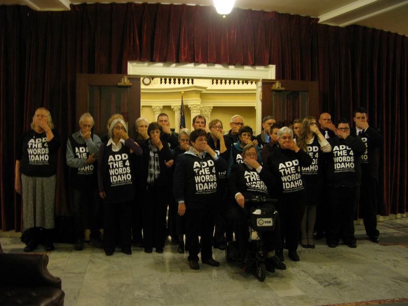 Silent protesters block the entrance to the Idaho Senate chambers on Monday morning (Betsy Russell)