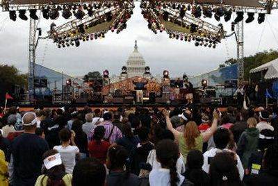 
Evangelist Luis Palau delivers his message from the main stage at the DC Festival with Luis Palau on the National Mall in Washington, D.C. last Sunday. The DC Festival, organized by the evangelist, featured  contemporary Christian and gospel music, children's play areas, and an extreme sports zone with demonstrations by Christian athletes. 
 (Associated Press / The Spokesman-Review)