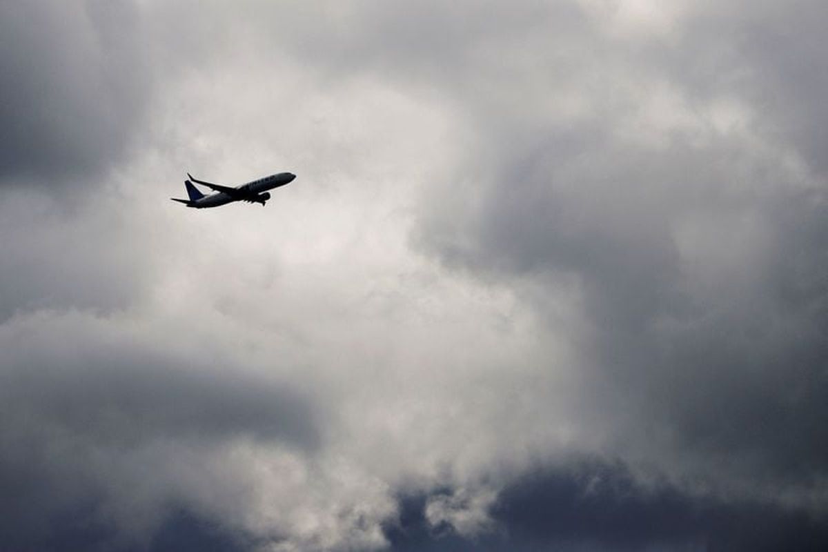 A United Airlines flight takes off from Logan International Airport, after U.S. Transportation Secretary Sean Duffy ordered flight cuts at some of the nation’s busiest airports, the latest travel disruption from the prolonged government shutdown, as seen from the Boston suburb of Everett, Massachusetts, U.S., November 6, 2025.  (Brian Snyder/Reuters)