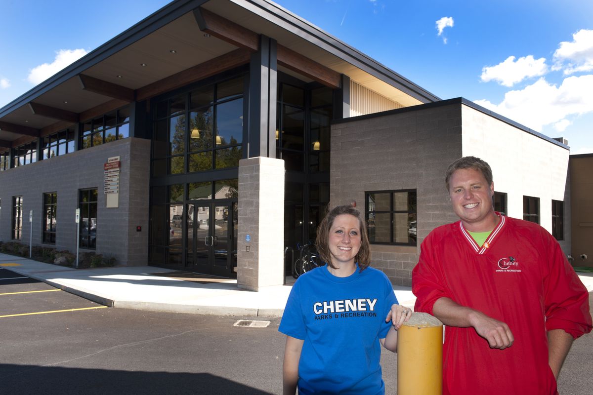 Kim Best and Paul Simmons stand in front of the renovated Wren Pierson Community Center in Cheney. (Colin Mulvany)