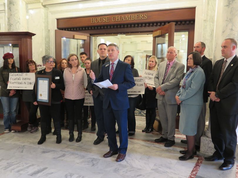 Rep. Brent Crane, R-Nampa, joins advocates against human trafficking, and a handful of other lawmakers, at a Statehouse news conference to announce planned legislation. (Betsy Russell)