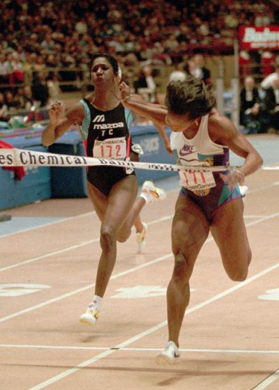 A year after winning the women's 60-meter dash at the 1993 USATF Indoor, Gail Devers (171) hits the tape ahead of Gwen Torrence (172) at the Millrose Games in New York's Madison Square Garden on Feb. 4, 1994.   (Associated Press)