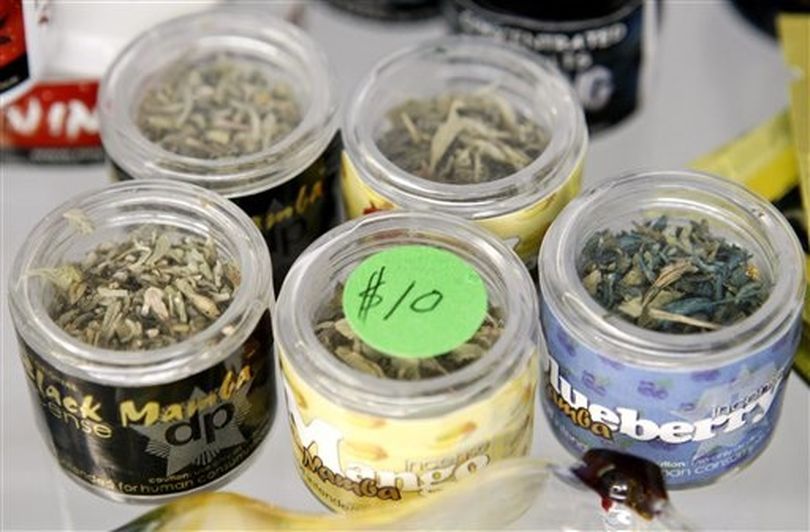 Dried leaves are visible in containers of incense not intended for human consumption at Enhale Smoke Shop in Tucson, Ariz., on Dec. 14, 2010. Federal authorities are planning to ban some of the chemicals found in a legal substance that they say, when smoked, gives a high similar to marijuana's but is potentially more dangerous.  (Greg Bryan / (AP Photo/Arizona Daily Star, Greg Bryan))