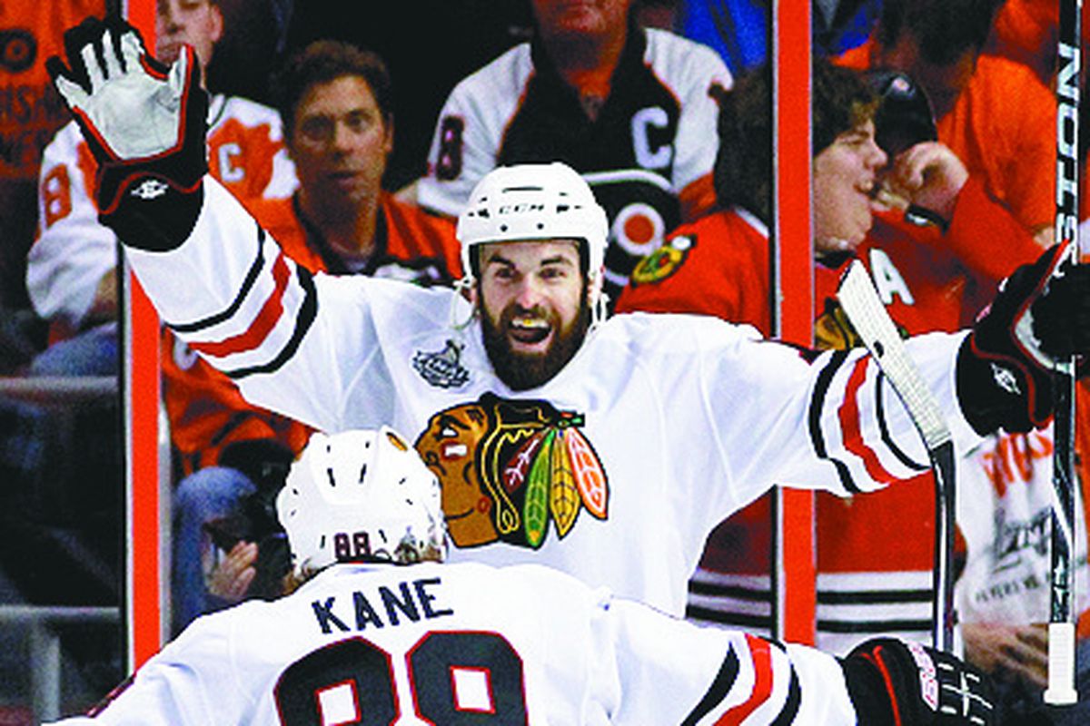 Blackhawks left wing Andrew Ladd celebrates his second-period goal. 