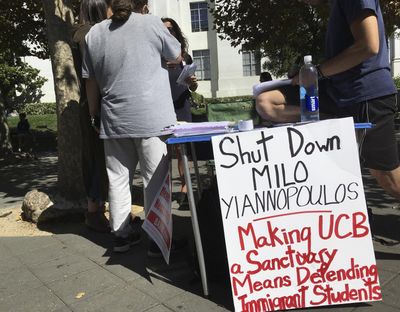 In this Sept. 21, 2017 photo, a group has put up flyers and a booth on Sproul Plaza calling for protesters to “Shut Down Milo Yiannopoulos,” at the University of California, Berkeley campus in Berkeley, Calif. Right-wing showman Milo Yiannopoulos is holding a “Free Speech Week” at the University of California, Berkeley with a planned lineup including conservative firebrands Steve Bannon. The university says it has no confirmation the headline acts will appear but is preparing strong security to head off any more violent protests at the liberal campus. (Jocelyn Gecker / Associated Press)