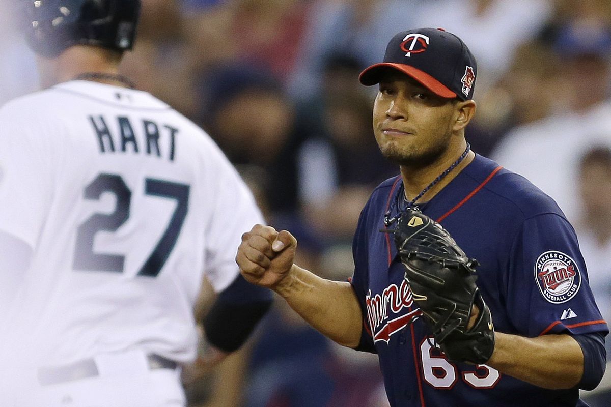 Minnesota Twins rookie Yohan Pino earned his first major league victory, helped by six runners stranded by Corey Hart of the Mariners. (Associated Press)