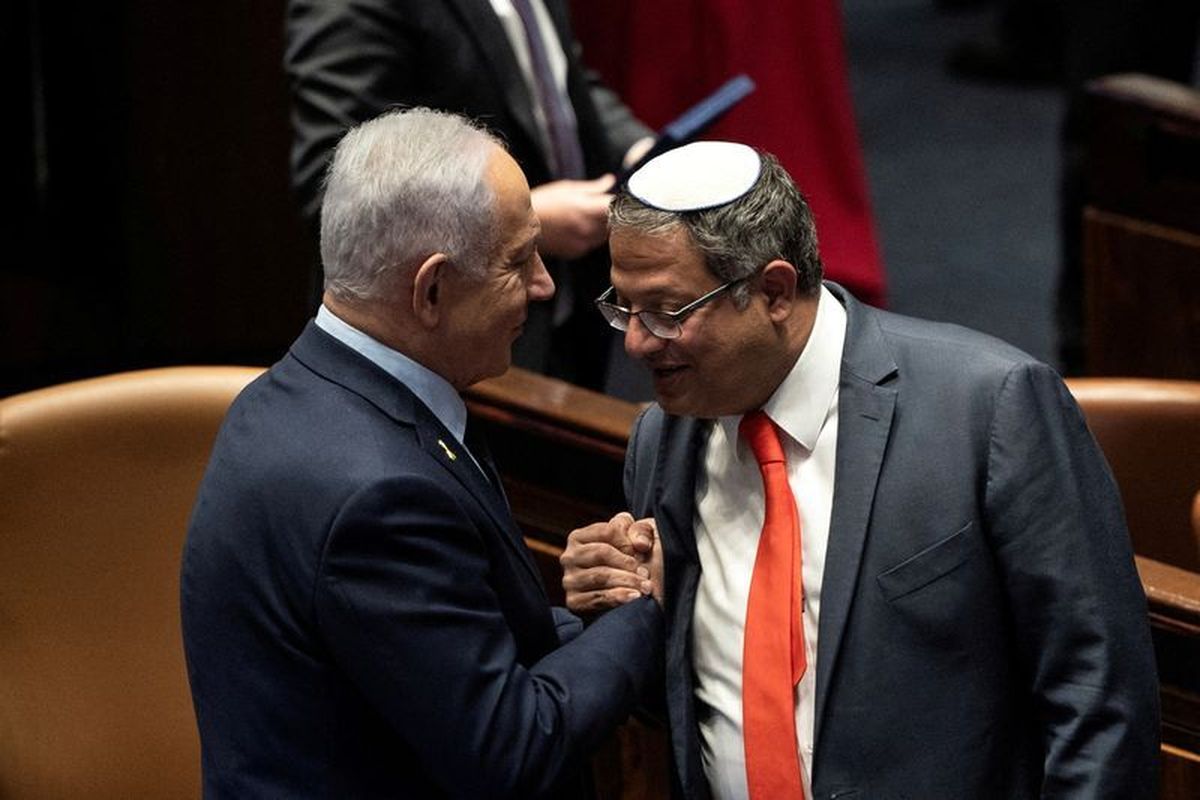 Israel Prime minister Benjamin Netanyahu and Itamar Ben Gvir shake hands as the Israeli government approve Netanyahu