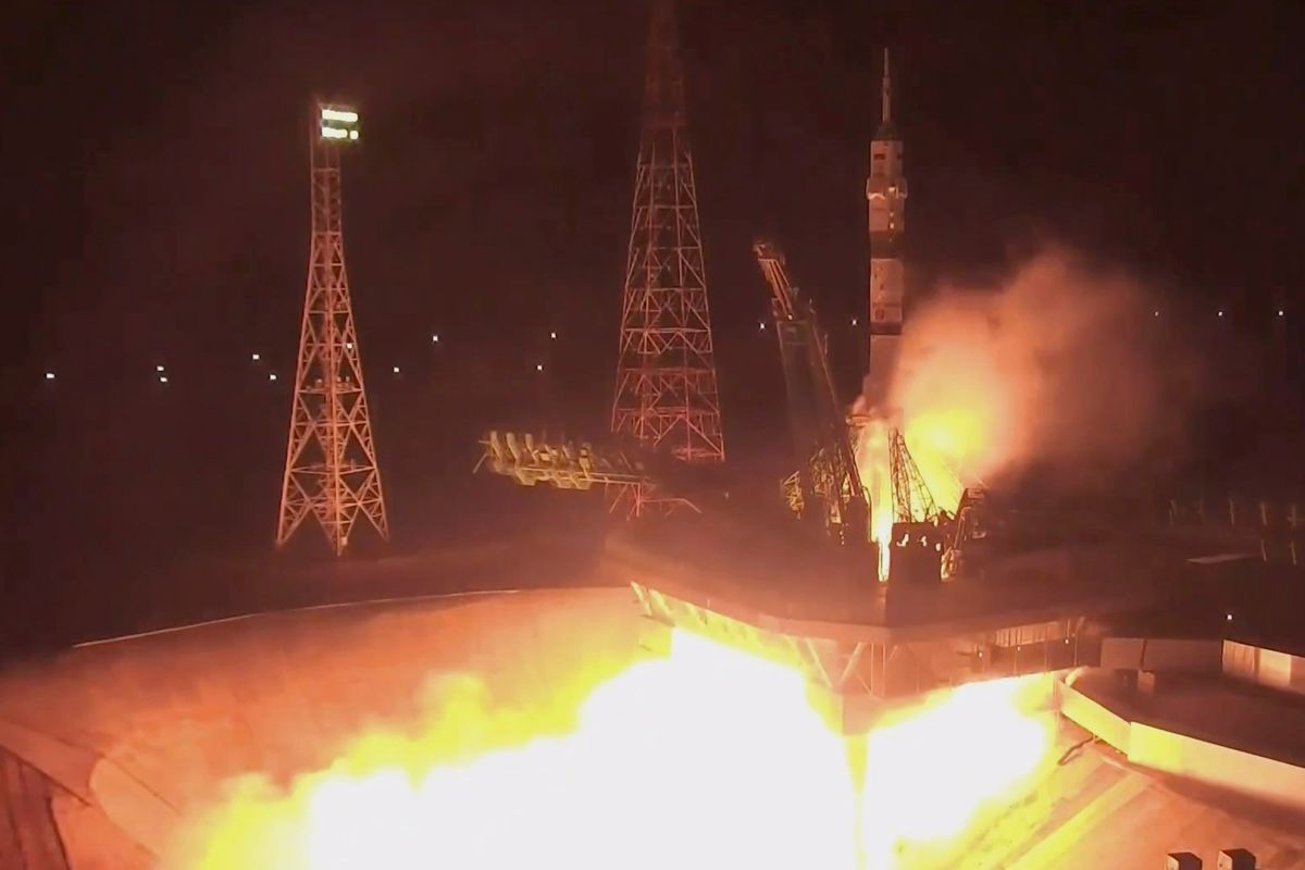 In this photo taken from video footage released by the Roscosmos Space Agency, the Soyuz-2.1a rocket booster with Soyuz MS-21 space ship carrying Russian cosmonauts Оleg Аrtemiev, Denis Мatveev and Sergei Korsakov to the International Space Station, ISS, blasts off at the Russian leased Baikonur cosmodrome, Kazakhstan, Friday, March 18, 2022.  (HOGP)