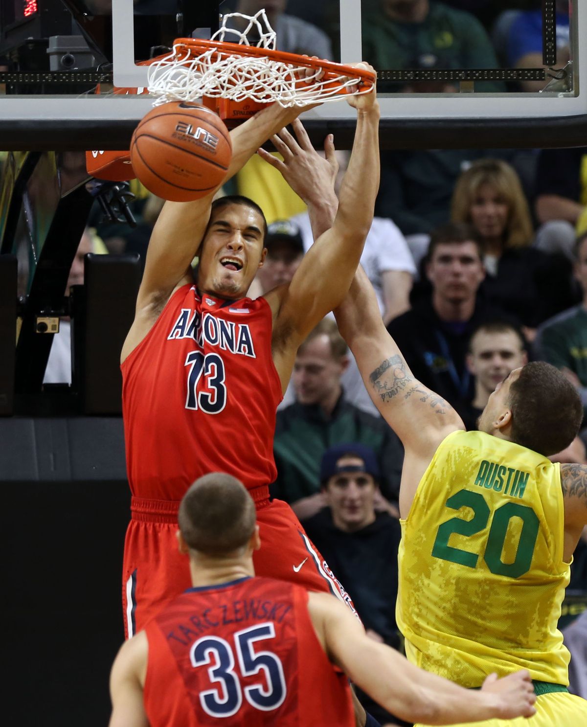 Arizona’s Nick Johnson (13) was named the Pac-12 Player of the Year. (Associated Press)