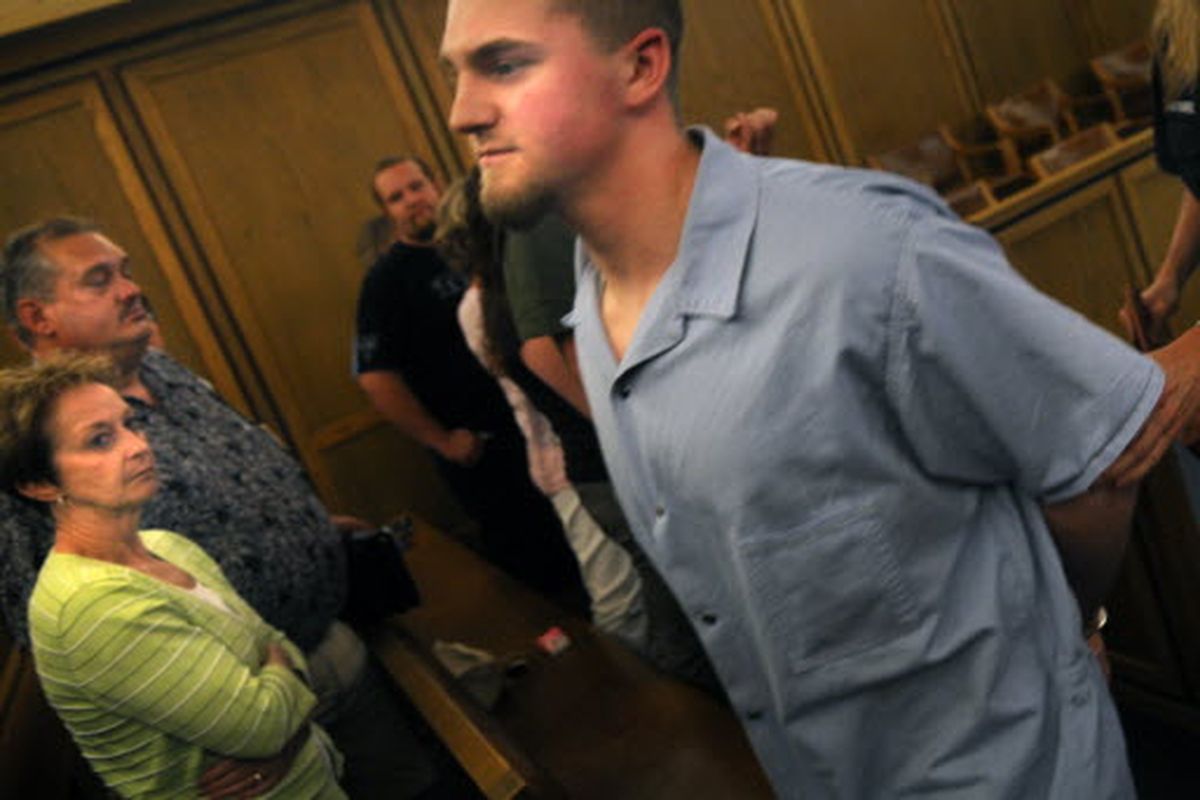 Justin Crenshaw walks past family members of Tanner Pehl on July 8, 2008. It was the family