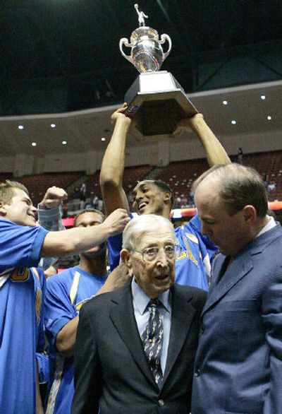 
Former UCLA coach John Wooden, center, and current coach Ben Howland have some history in common.
 (Associated Press / The Spokesman-Review)