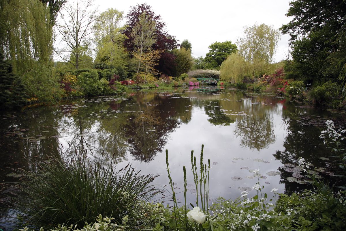 The Japanese-inspired water garden of Monet, the French impressionist painter, waits Monday ahead of the re-opening in Giverny, west of Paris.  (Francois Mori)