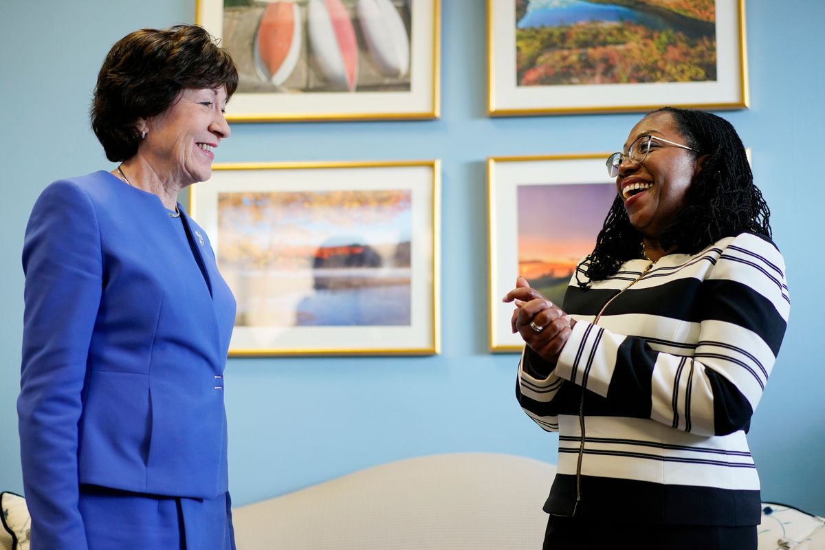 FILE - Supreme Court nominee Ketanji Brown Jackson meets with Sen. Susan Collins, R-Maine, on Capitol Hill in Washington, March 8, 2022. Collins will vote to confirm Ketanji Brown Jackson, giving Democrats at least one Republican vote and all but assuring that she will become the first Black woman on the Supreme Court.  (Carolyn Kaster)