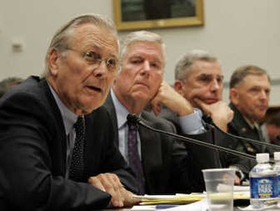 
Former Defense Secretary Donald  Rumsfeld, left, and others testify on Capitol Hill in Washington on Wednesday at a hearing investigating the friendly-fire death of Pat Tillman in Afghanistan. Associated Press
 (Associated Press / The Spokesman-Review)