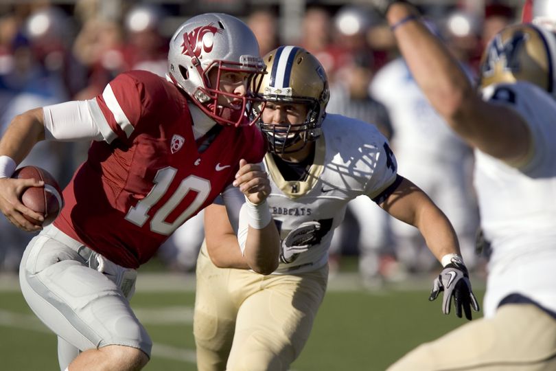 Washington State quarterback Jeff Tuel (10) scrambles while pursued by Montana State linebacker Aleksei Grosulak during the first quarter of an NCAA college football game Saturday, Sept. 11, 2010, at Martin Stadium in Pullman, Wash. (Dean Hare / Fr158448 Ap)