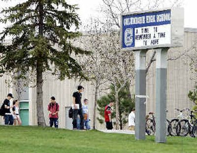 
Students leave Columbine High School at the end of classes in Littleton, Colo., on Tuesday, the eve of the sixth anniversary of the shooting at the school where two teenage gunmen fatally shot 12 classmates and a teacher before killing themselves. 
 (Associated Press / The Spokesman-Review)