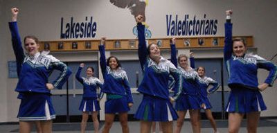 
Lakeside High School varsity cheerleaders practice a routine at the school in Nine Mile Falls.  The team is  raising money for a trip to Orlando, Fla., to perform in the Capital One Bowl pregame show. 
 (DAN PELLE photos / The Spokesman-Review)